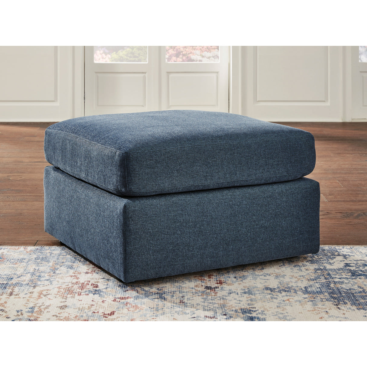 A room setting featuring Modmax Ink Ottoman