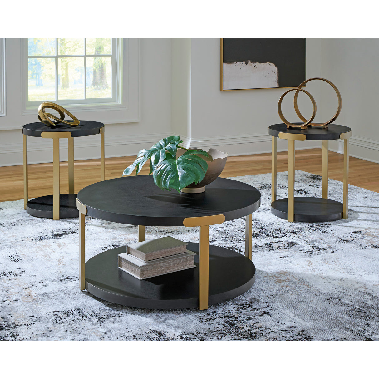 A room setting featuring Shylore Black Set of 3 Tables