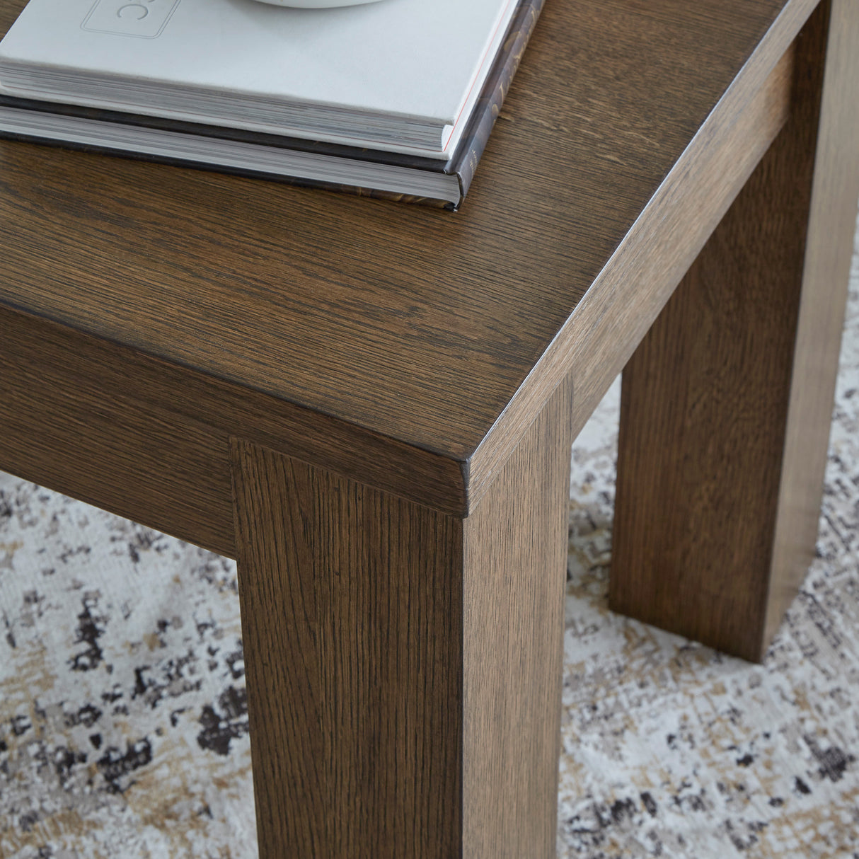 Detail view of Rosswain Warm Brown Square End Table