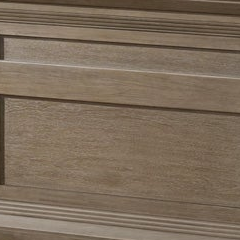A close-up of a wood grain surface with horizontal panel lines and a warm medium-brown tone.