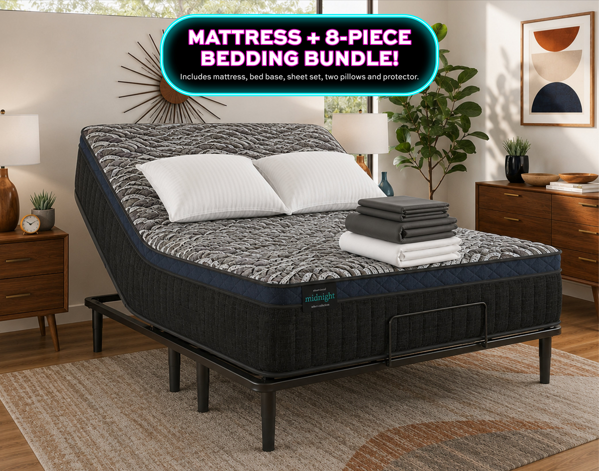 A room setting featuring Slumberland Midnight Select Medium Pillowtop Queen Bedding Bundle