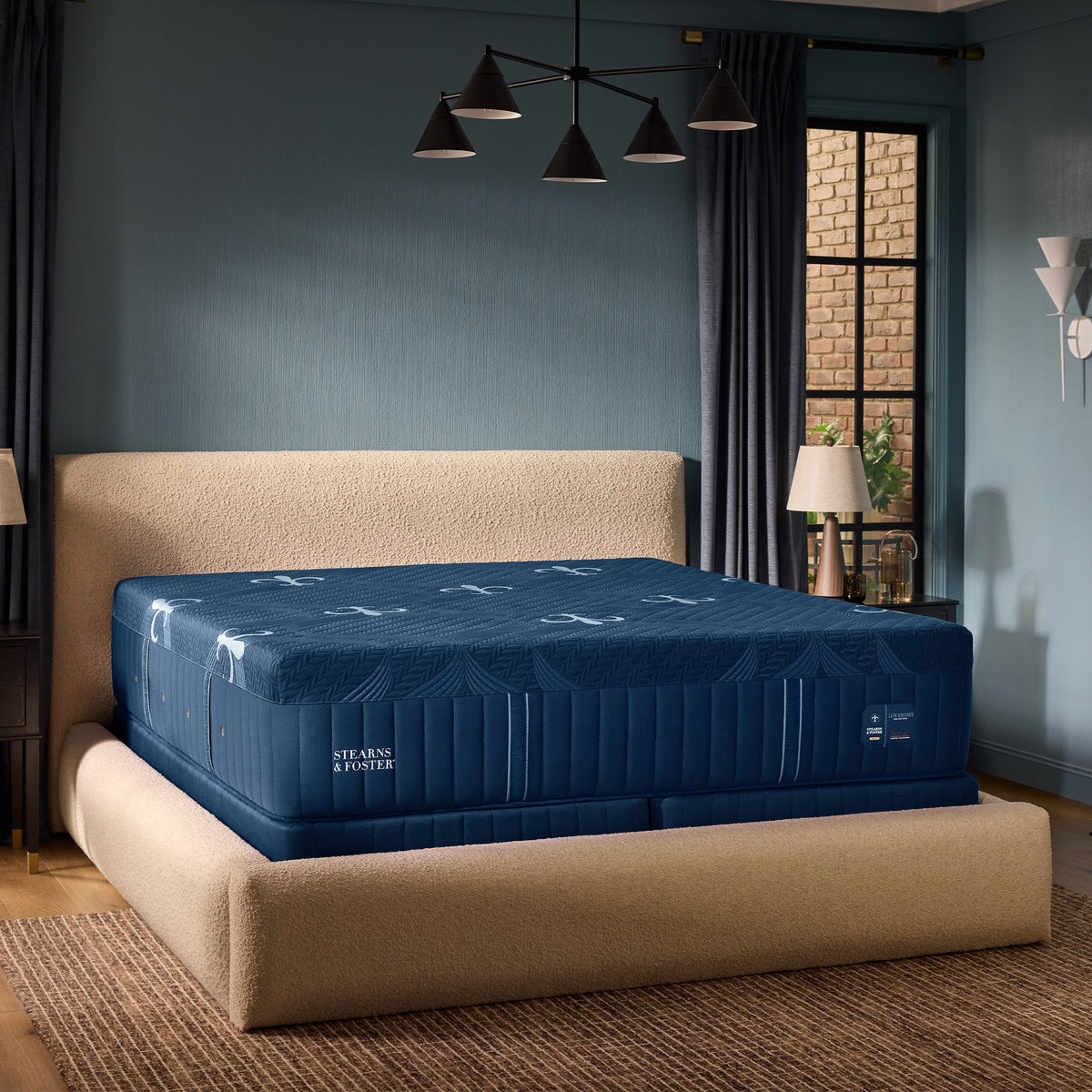 A room setting featuring Stearns and Foster Lux Estate Soft Hybrid II Split California King Mattress Set