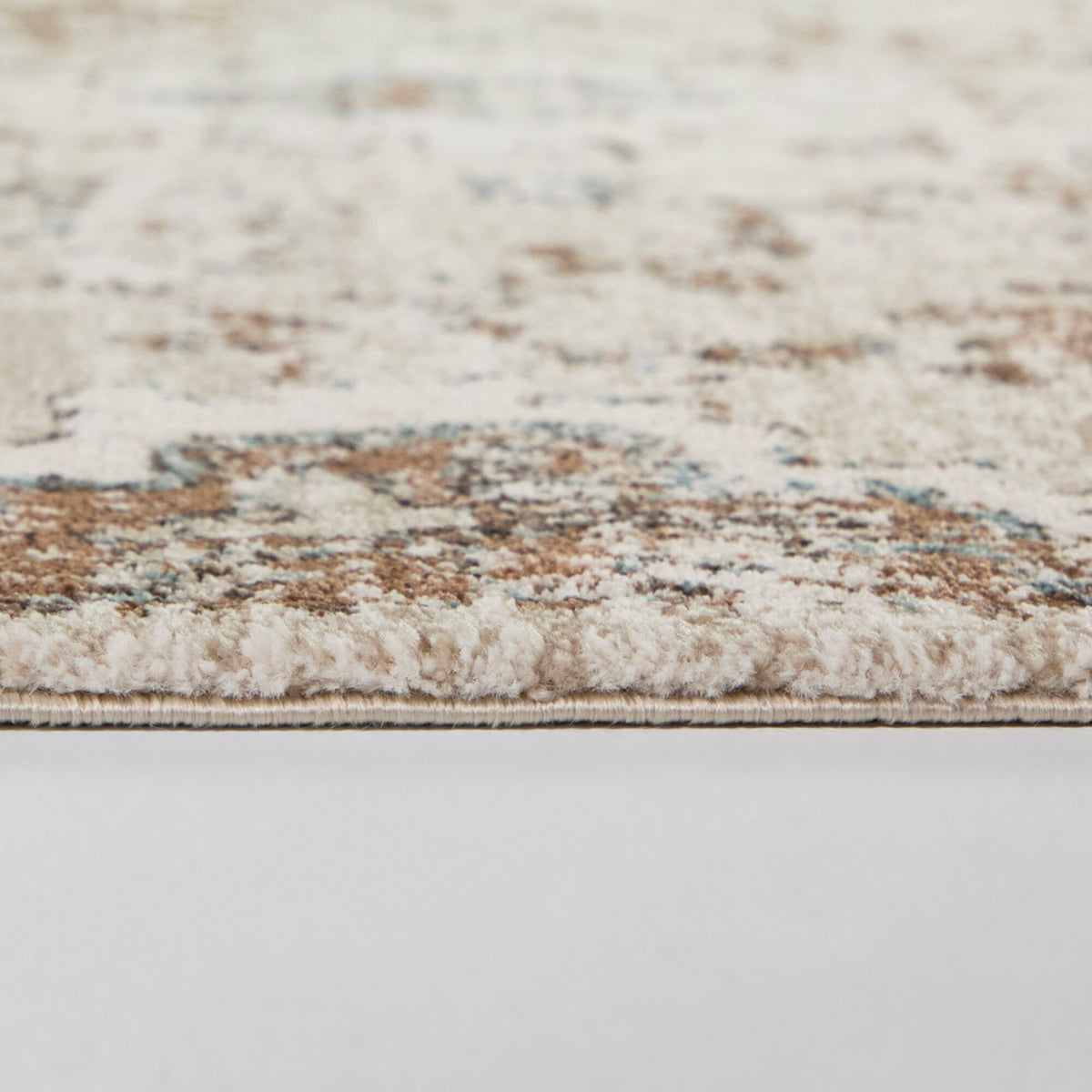 Detail view of Annan Cream 5x8 Rug