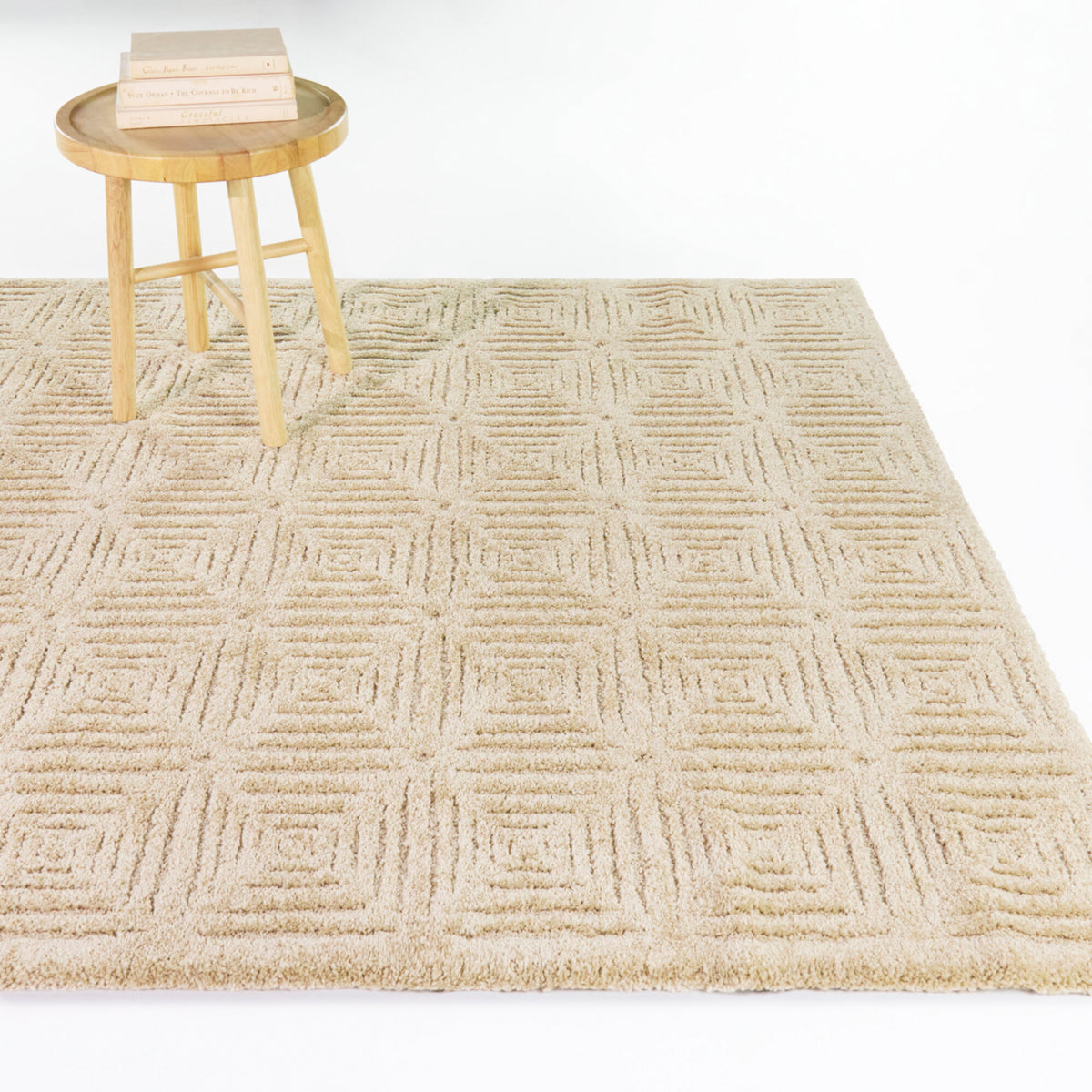 A room setting featuring Bolsena Beige 5x8 Rug