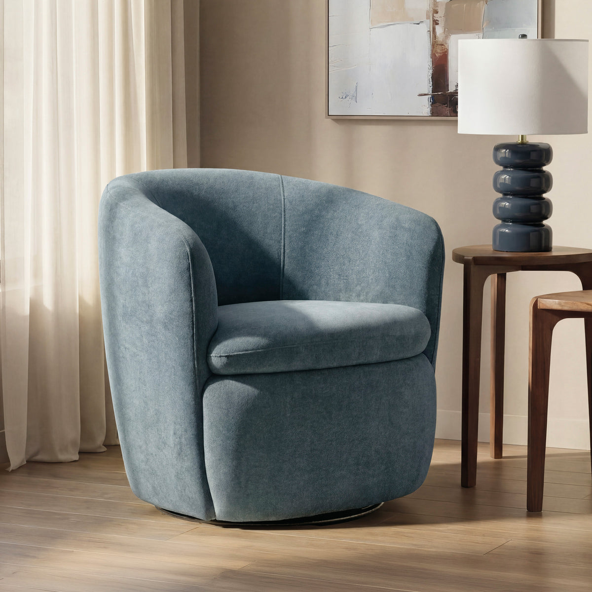 A room setting featuring Leemont Mist Swivel Chair