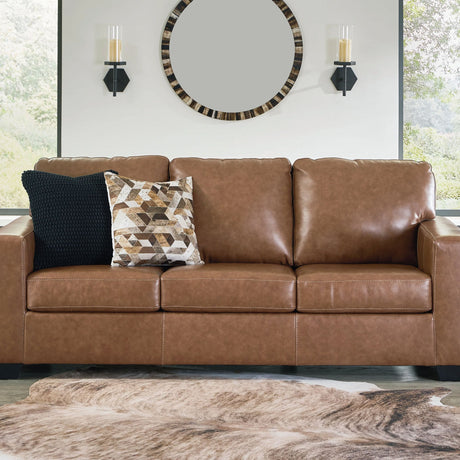 Tan sofa with throw pillows