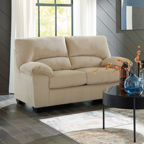 Gray loveseat with throw pillows