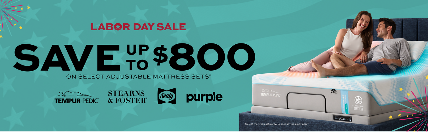 Labor Day Sale, Save up to $800 on select adjustable mattress sets.  Tempur-Pedic, Stearns & Foster, Sealy, Purple, Shop Now.  Advertisement for a Labor Day sale on mattresses with a couple on a mattress and brand logos.