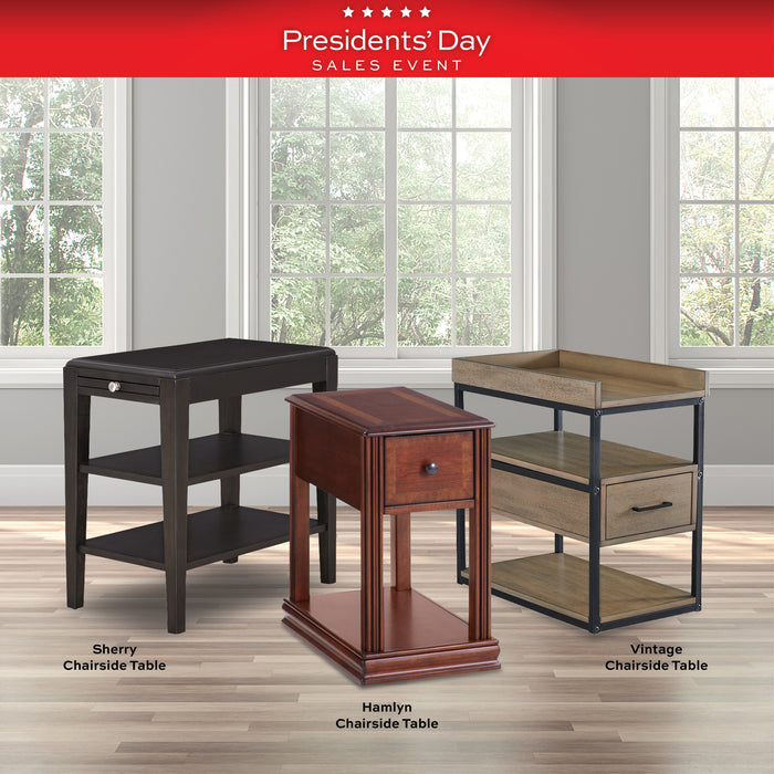Three chairside tables in different styles on a wooden floor with a 'Presidents' Day Sales Event' banner at the top.
