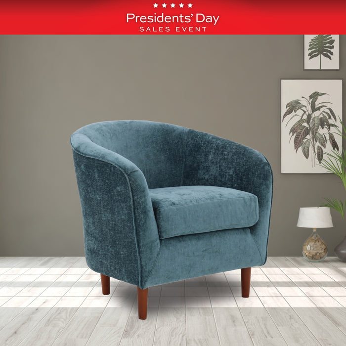 Blue armchair in a room with a 'Presidents' Day Sales Event' banner at the top.