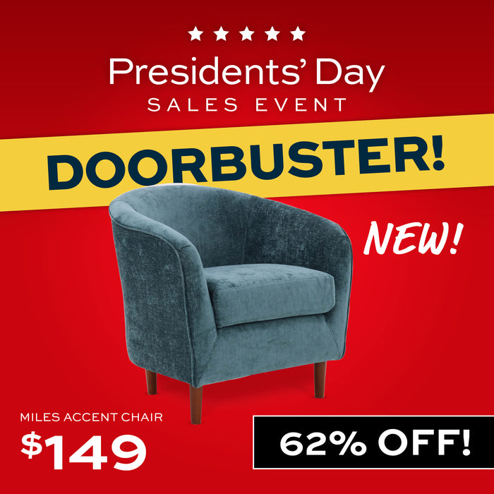 Blue velvet armchair in a room with decorative elements and 'DOORBUSTER!' text.