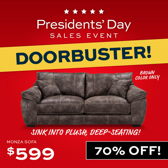 Brown sofa in a room with 'DOORBUSTER!' text at the top.