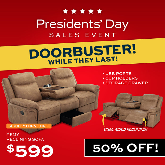 Brown sofa in a room with 'DOORBUSTER!' text at the top.