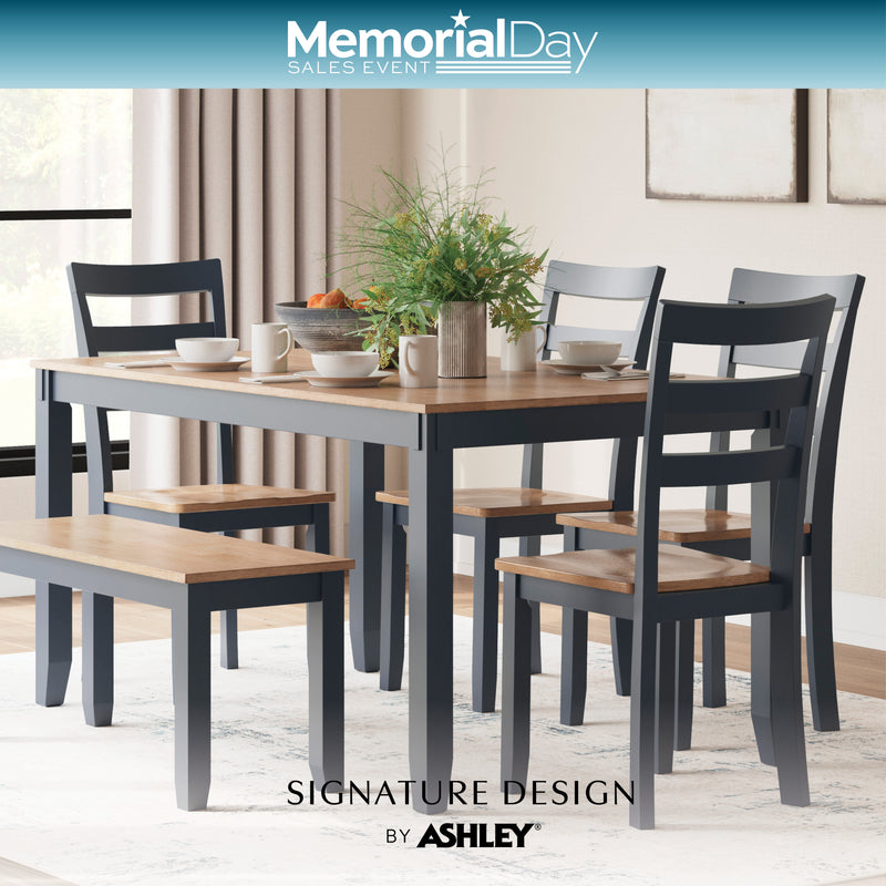 Dining room set with table and chairs in a room with windows, featuring Memorial Day sales text.