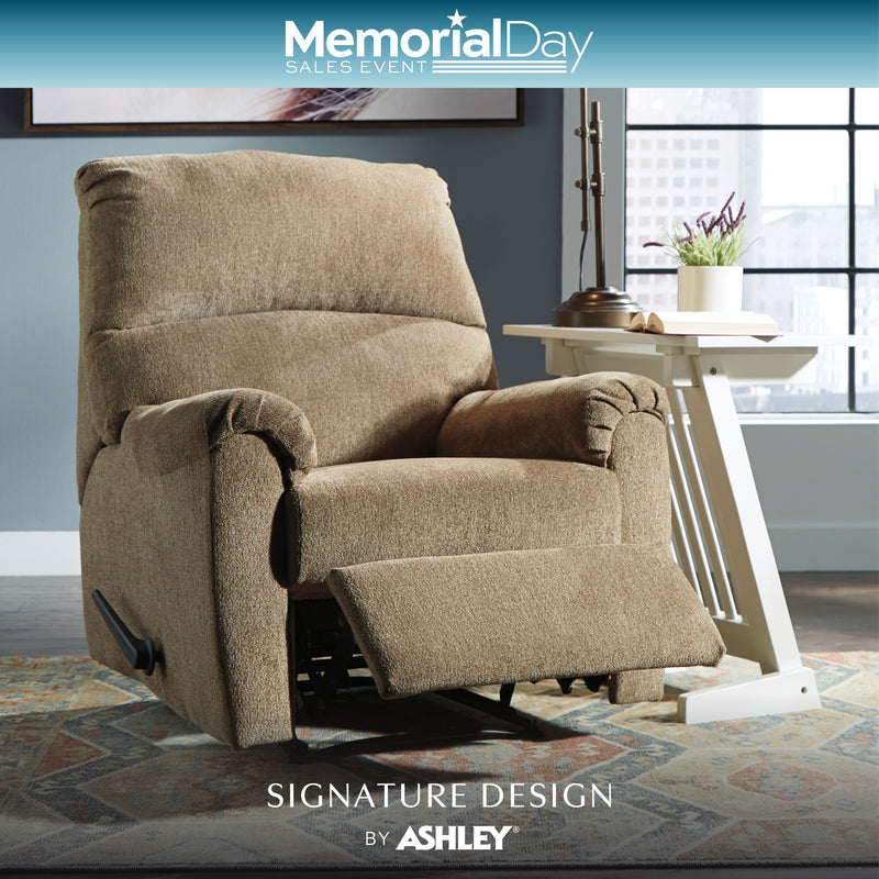 Beige recliner chair in a living room setting with 'Memorial Day Sales Event' text and 'Signature Design by Ashley' branding.