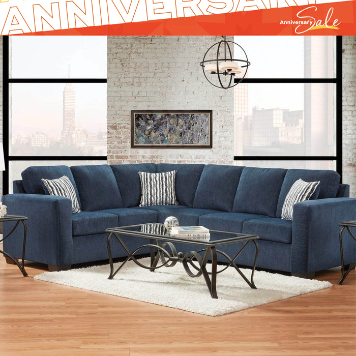 Blue sectional sofa in a living room with 'Anniversary Sale' text overlay.