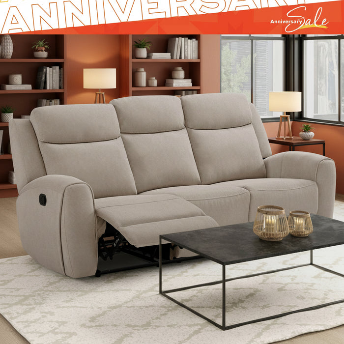 Beige sofa with reclining feature in a modern living room setting, featuring an 'Anniversary Sale' banner.