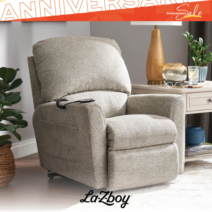 Gray recliner chair with 'LaZboy' branding in a home setting.