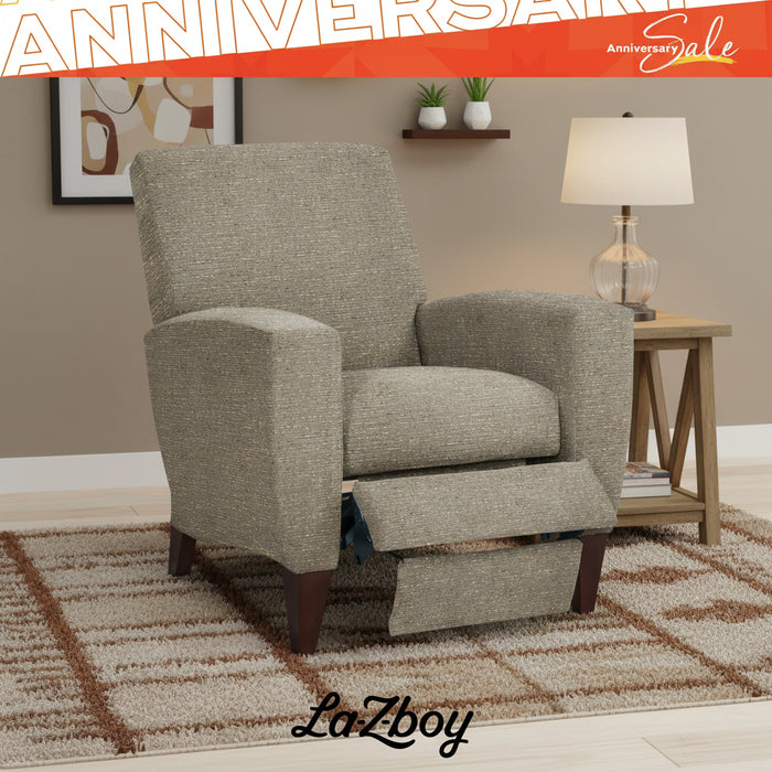Gray recliner chair with footrest in a living room setting, featuring 'LaZboy' branding.