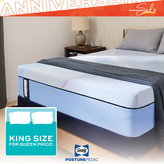 King size mattress on a bed with Sealy Posturepedic branding and 'Anniversary Sale' text.