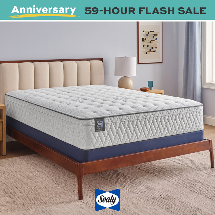 Sealy mattress on a bed frame with 'Anniversary 59-Hour Flash Sale' text and Sealy logo.