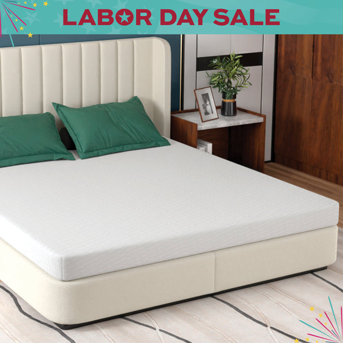 Bed with green pillows in a room with a 'Labor Day Sale' banner above.