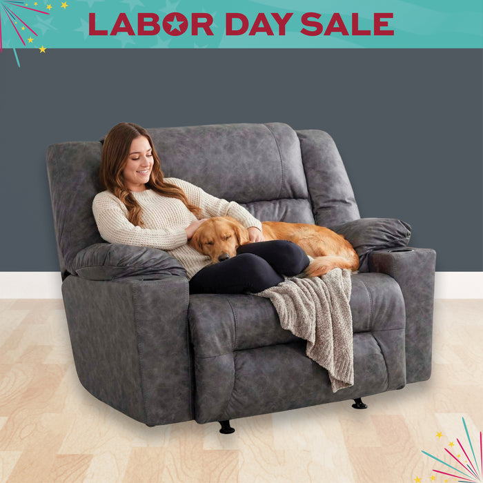 Woman sitting on a gray recliner with a dog, surrounded by Labor Day sale graphics.