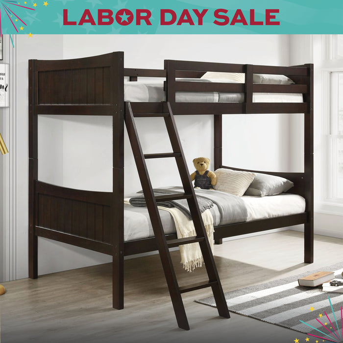 Wooden bunk bed with bedding and a teddy bear in a room with a 'Labor Day Sale' banner.