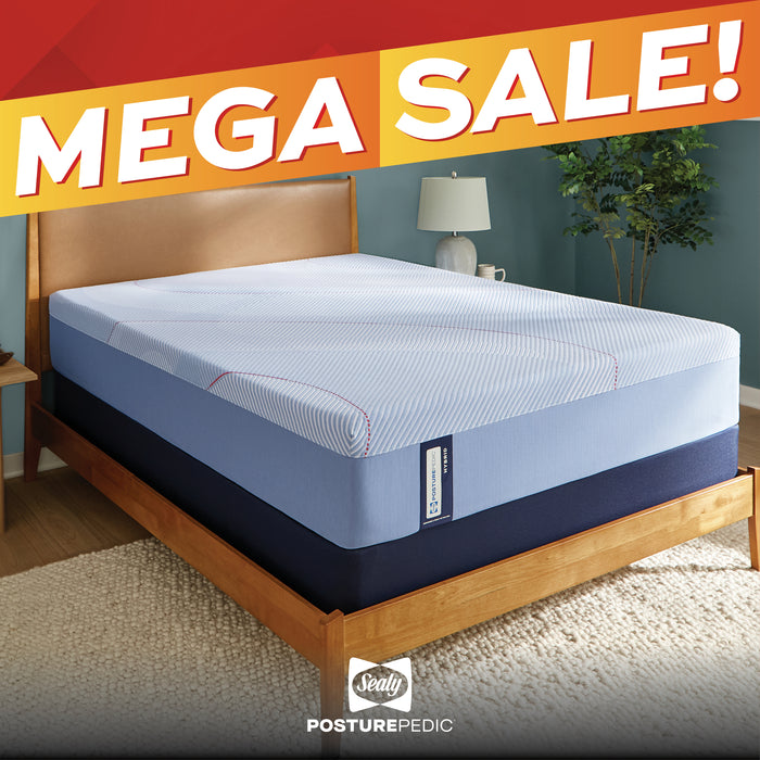 A mattress on a wooden bed frame in a styled bedroom setting, with a large orange and red 'MEGA SALE!' banner across the top and a PosturePedic logo at the bottom.