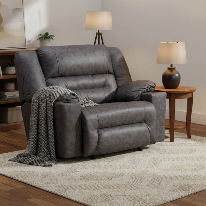 Gray recliner chair in a living room setting with a wooden side table and lamps.