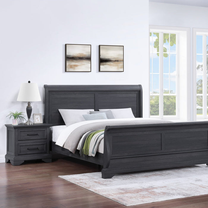 Dark wood bedroom set with bed, nightstands, and dresser in a room with large windows.