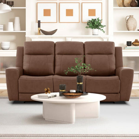 Brown leather sofa set in a modern living room with decor elements.