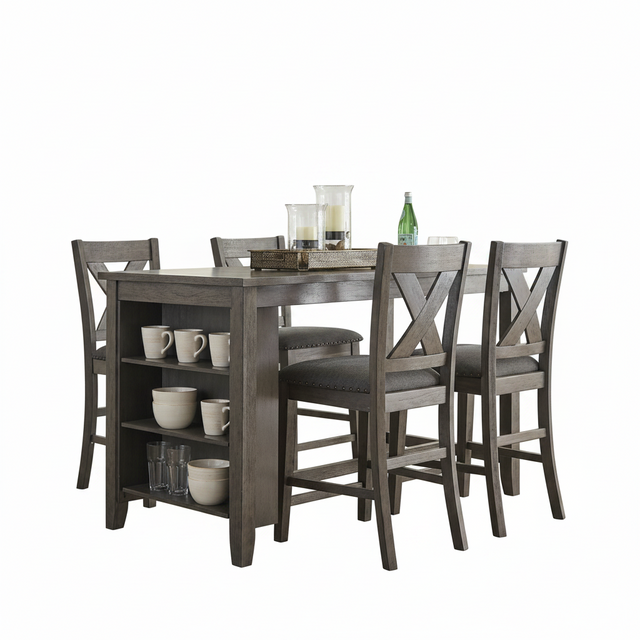 A 5-piece counter height dining table set with a gray wood-grain finish, featuring four matching high-back chairs with X-backs and a small storage shelf under the table. The set is styled with white ceramic mugs, glasses, candles, and a green glass bottle on a solid white background.
