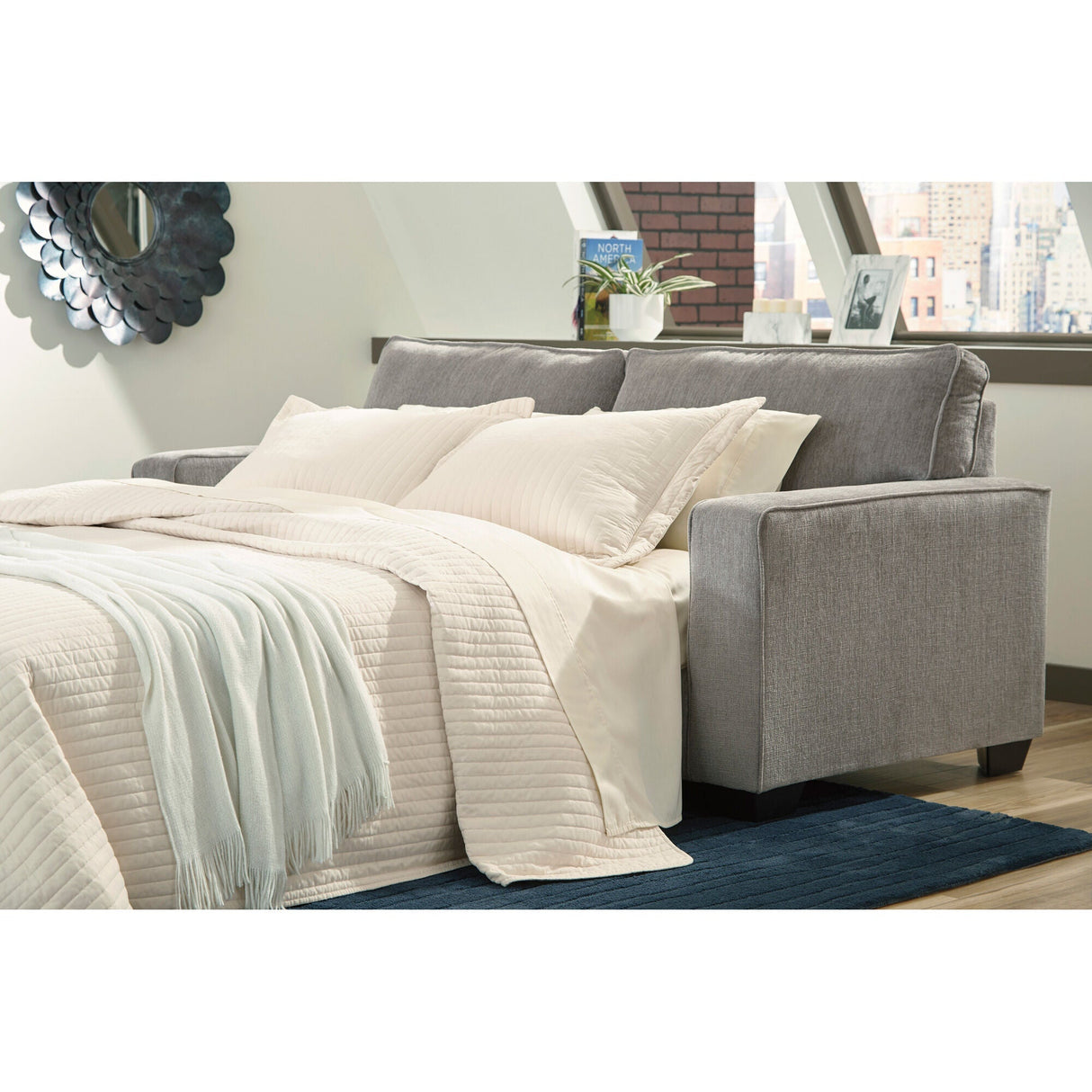 A room setting featuring Riles Alloy Queen Sofa Sleeper