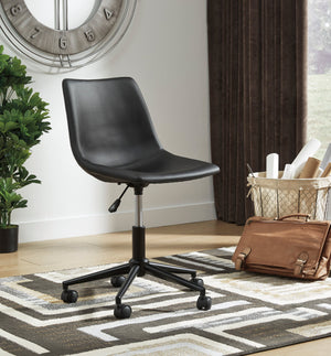 A room setting featuring Hudson Black Desk Chair
