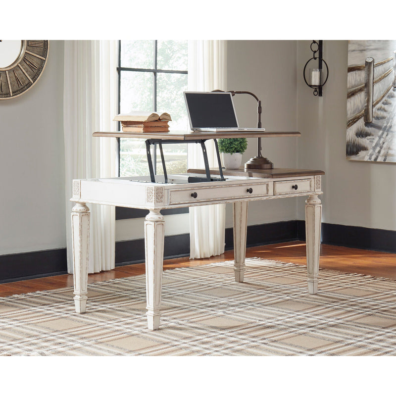 A room setting featuring Realyn White Lift Top Desk