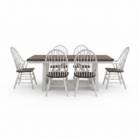 A 7-piece dining set featuring a rectangular table with a dark brown wood top and a distressed white base, surrounded by six matching spindle-back chairs with white frames and dark brown seats, shown on a solid white background.