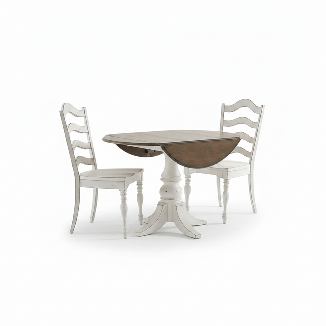 A round drop-leaf dining table with a whitewashed pedestal base and two matching white ladder-back chairs, shown on a clean white background.