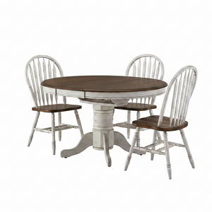 A 5-piece dining table set featuring a round pedestal table with a dark brown wood top and white distressed base, accompanied by four matching spindle-back chairs with white frames and brown wooden seats, shown on a solid white background.