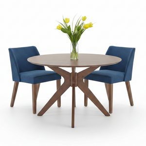 A round dining table with a light brown wood-grain top and X-shaped wooden legs, accompanied by two blue upholstered chairs. A clear glass vase filled with yellow tulips sits in the center of the table on a clean white background.