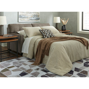 A room setting featuring Mahoney Chocolate Full Sofa Sleeper