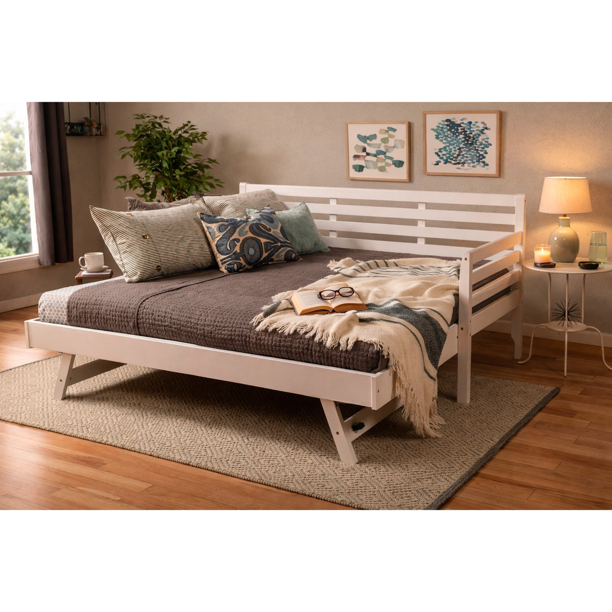 A room setting featuring Boho White Daybed with Pop Up Trundle
