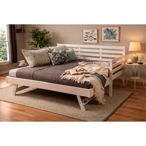 A room setting featuring Boho White Daybed with Pop Up Trundle