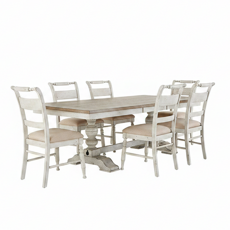 A seven-piece trestle dining set with a planked top and turned pedestals, featuring weathered gray tops and antique linen finish, accompanied by six upholstered side chairs with nylon chair glides.