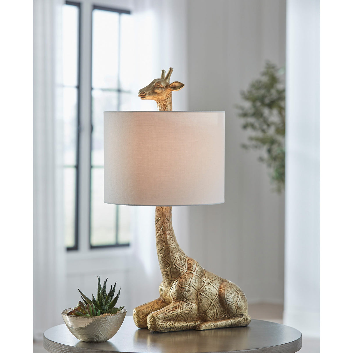 A room setting featuring Ferrison Gold Table Lamp