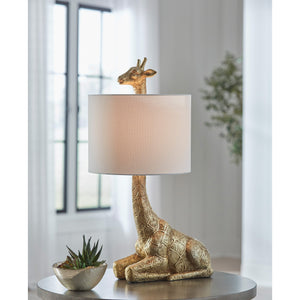 A room setting featuring Ferrison Gold Table Lamp