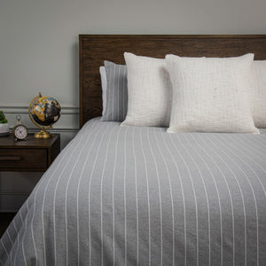 Front view of grey Willow Lane Comforter and pillows