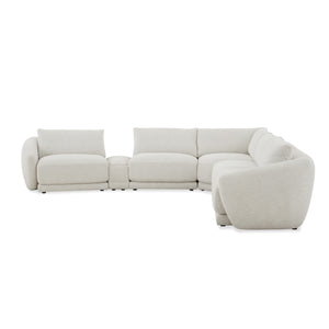 Beige sectional sofa on a white background