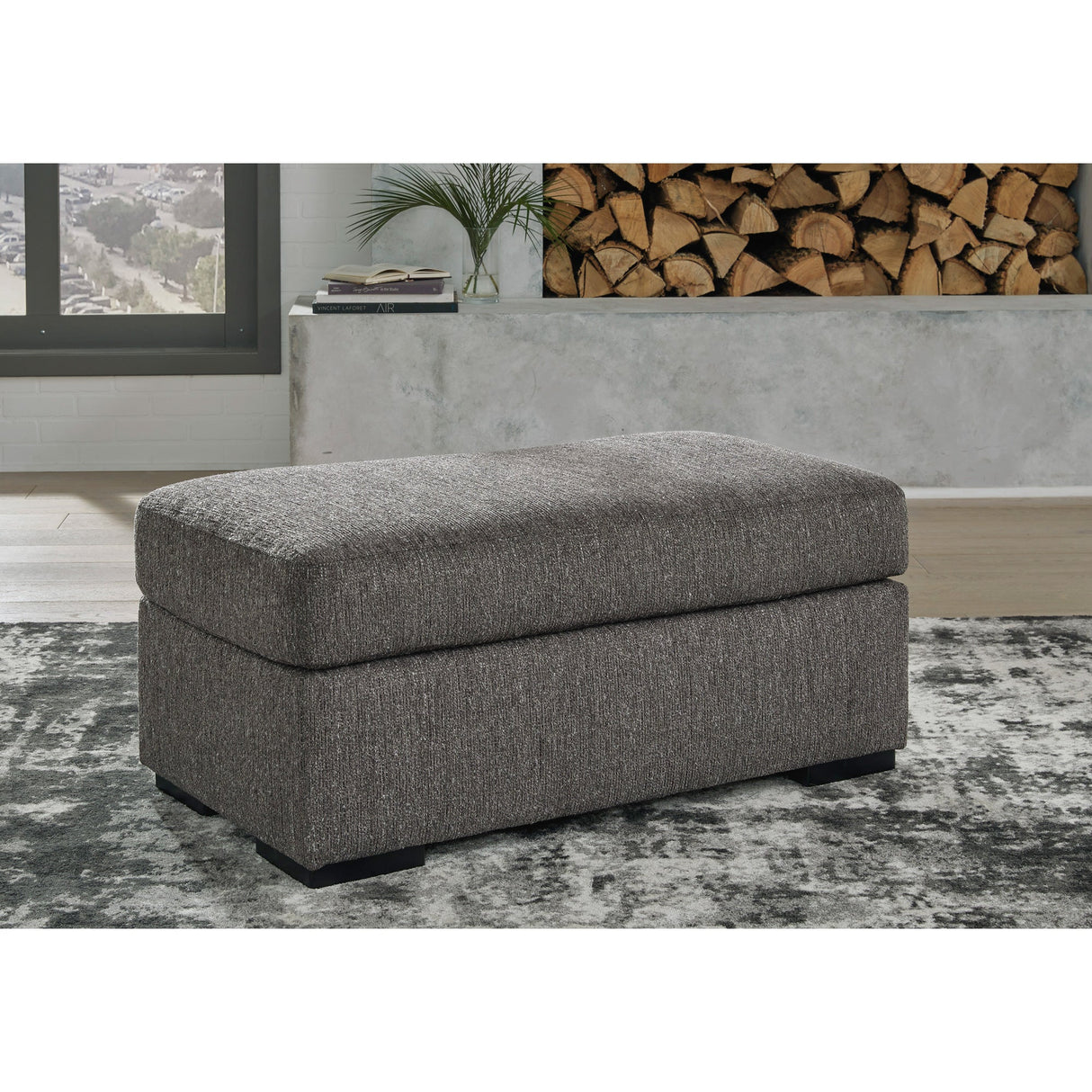 A room setting featuring Gardiner Pewter Ottoman