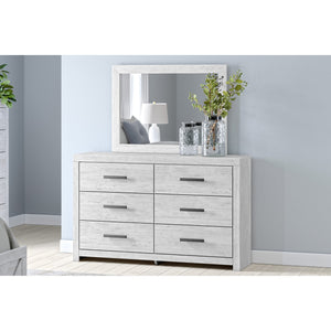 A room setting featuring Cayboni White Mirror